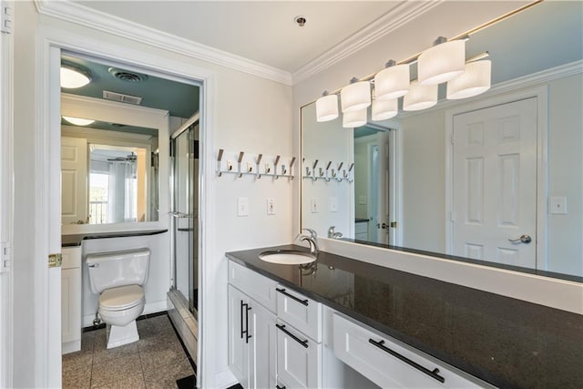 full bath featuring a shower stall, toilet, ornamental molding, granite finish floor, and vanity