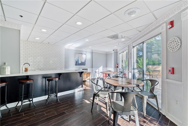 dining room featuring wood finish floors and recessed lighting