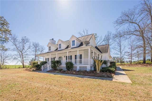 view of front of property featuring a front yard and covered porch