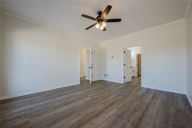 unfurnished bedroom featuring ornamental molding, dark wood-style flooring, and baseboards