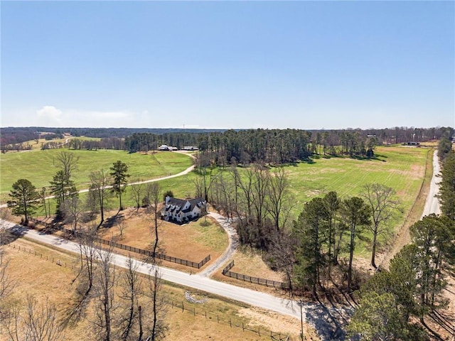 birds eye view of property featuring a rural view