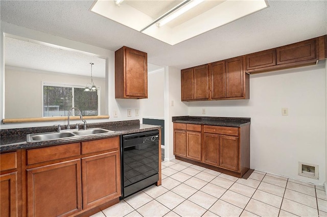 kitchen featuring light tile patterned flooring, black dishwasher, sink, and a textured ceiling