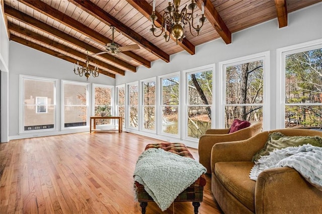 sunroom / solarium featuring a chandelier, wood ceiling, and lofted ceiling with beams