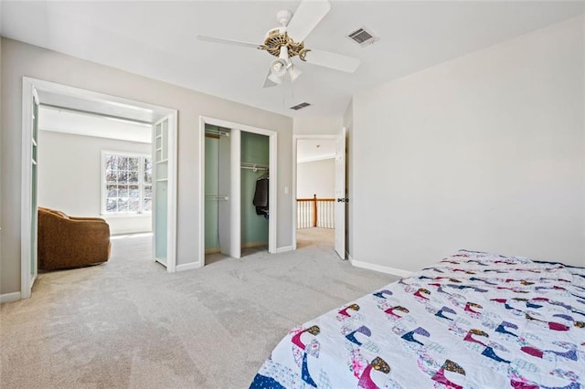 bedroom with carpet flooring, baseboards, and visible vents