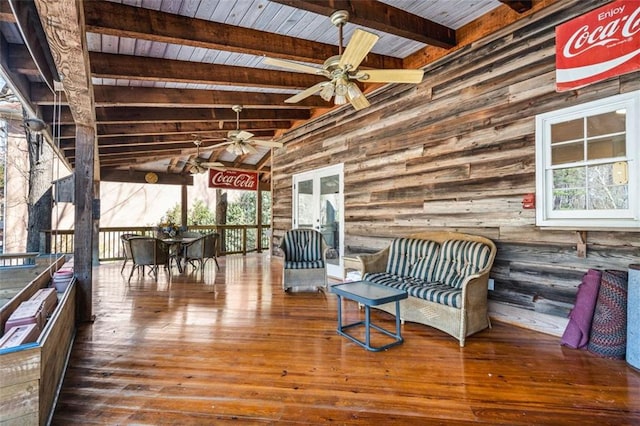 deck with french doors and ceiling fan