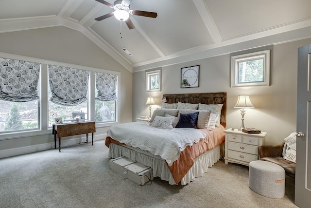 bedroom with light carpet, ceiling fan, vaulted ceiling, and multiple windows