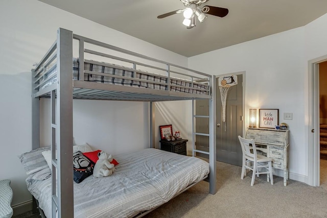 bedroom featuring light carpet and ceiling fan