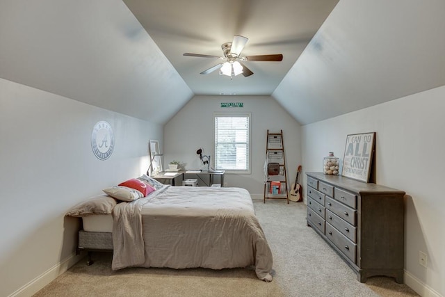 carpeted bedroom featuring ceiling fan and lofted ceiling