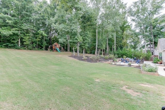 view of yard featuring a playground