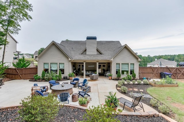 back of property featuring a patio