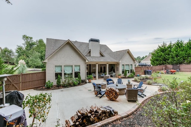 rear view of house featuring a patio area