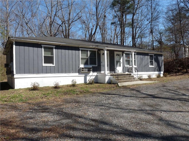 manufactured / mobile home featuring covered porch