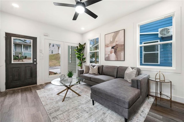 living room with recessed lighting, wood finished floors, and ceiling fan