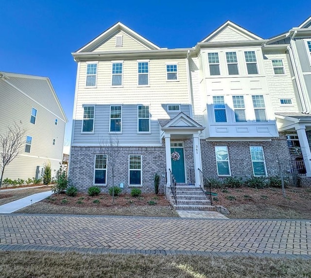 multi unit property with brick siding