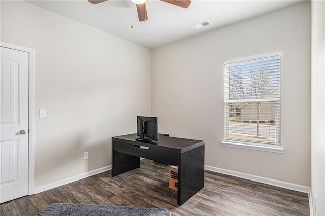 office space with a ceiling fan, baseboards, visible vents, and wood finished floors