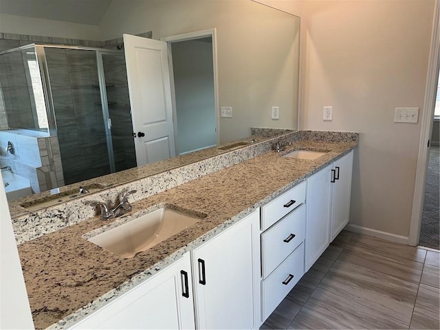 57 Longhorn Way, Auburn, GA 30011 - bathroom featuring double vanity, a stall shower, baseboards, tile patterned floors, and a bathtub