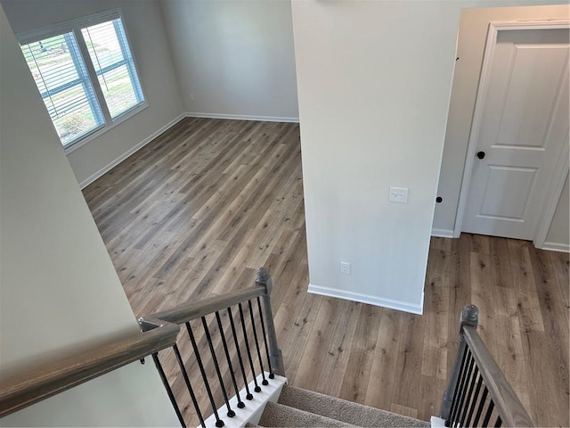 57 Longhorn Way, Auburn, GA 30011 - stairway featuring wood finished floors and baseboards