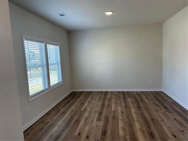 57 Longhorn Way, Auburn, GA 30011 - empty room with wood finished floors, baseboards, and recessed lighting