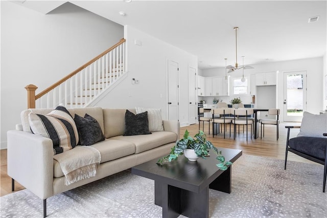 living room with light hardwood / wood-style floors