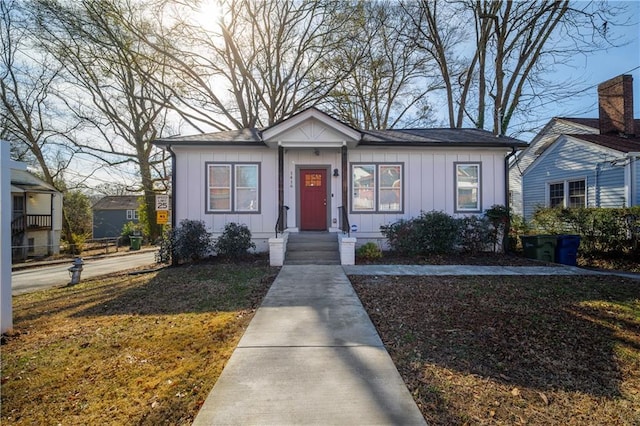 bungalow-style house featuring board and batten siding