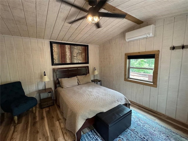 225 Overlook Cir, Clarkesville, GA 30523 - bedroom with a wall unit AC, wood finished floors, wood walls, wooden ceiling, and ceiling fan