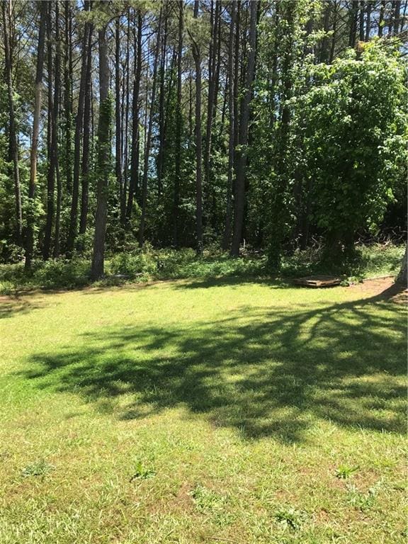 75 Oak Hill Dr, Covington, GA 30016 - view of green lawn