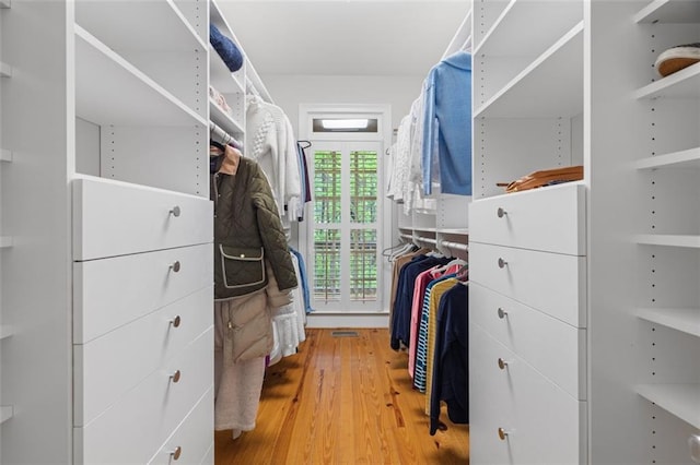 74 Cherokee Way, Big Canoe, GA 30143 - walk in closet featuring light wood-style flooring