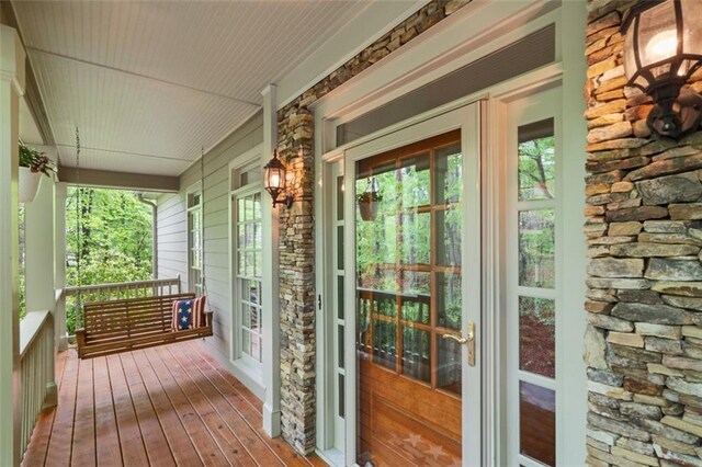 74 Cherokee Way, Big Canoe, GA 30143 - wooden terrace with covered porch
