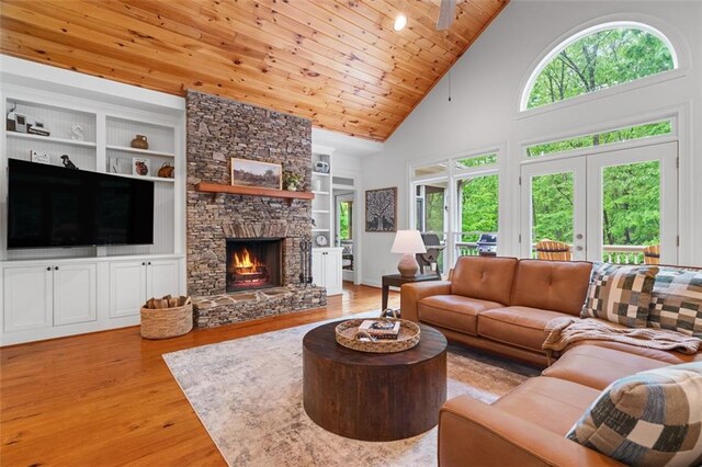 74 Cherokee Way, Big Canoe, GA 30143 - living room with built in shelves, wooden ceiling, high vaulted ceiling, and wood finished floors