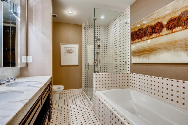 1820 Peachtree St NW Unit 811, Atlanta, GA 30309 - full bathroom featuring double vanity, a garden tub, a stall shower, and toilet