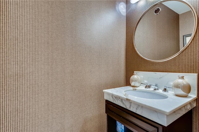 1820 Peachtree St NW Unit 811, Atlanta, GA 30309 - bathroom featuring vanity and wallpapered walls