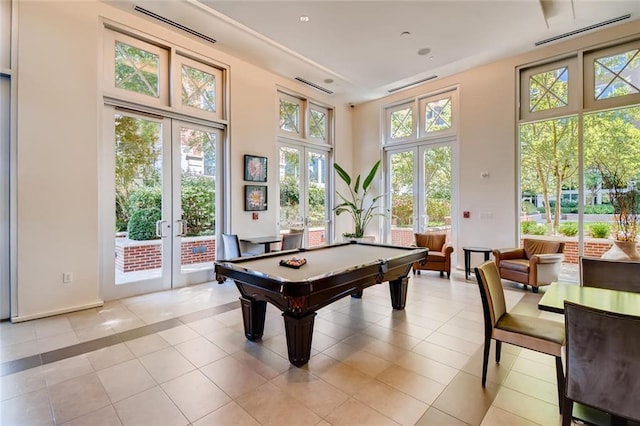 1820 Peachtree St NW Unit 811, Atlanta, GA 30309 - recreation room featuring french doors, billiards, light tile patterned floors, a towering ceiling, and recessed lighting