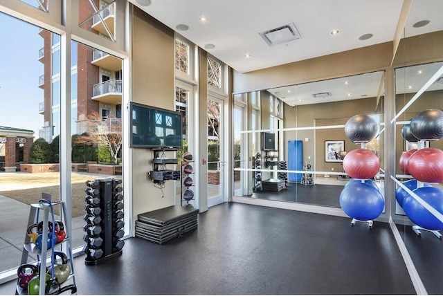 1820 Peachtree St NW Unit 811, Atlanta, GA 30309 - exercise room with healthy amount of natural light, french doors, and recessed lighting