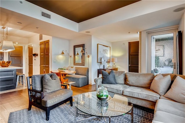 1820 Peachtree St NW Unit 811, Atlanta, GA 30309 - living area with light wood-style floors and baseboards