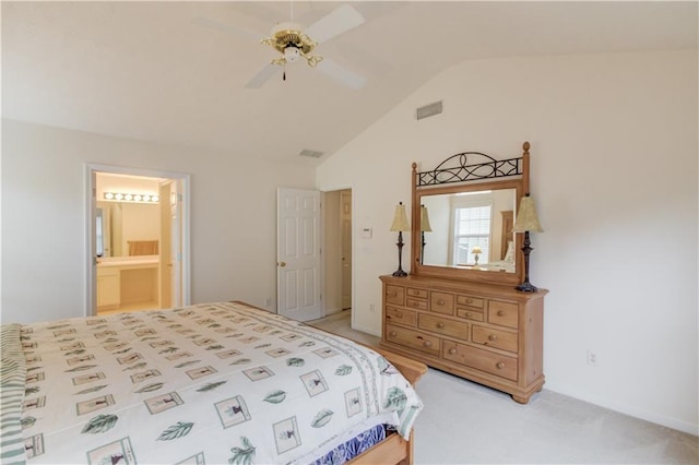 bedroom featuring lofted ceiling, light carpet, and a ceiling fan