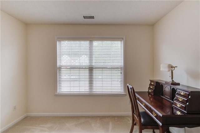 office with carpet flooring, baseboards, and plenty of natural light