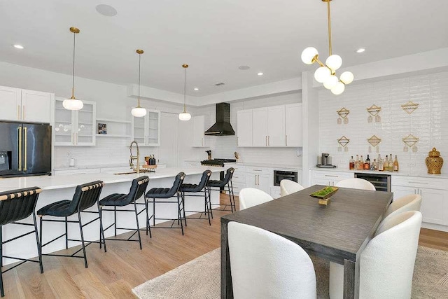 1598 Athens Ave, Atlanta, GA 30310 - dining space featuring recessed lighting, wine cooler, and light wood-type flooring