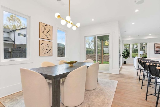1598 Athens Ave, Atlanta, GA 30310 - dining room with recessed lighting, baseboards, light wood-style floors, visible vents, and a notable chandelier