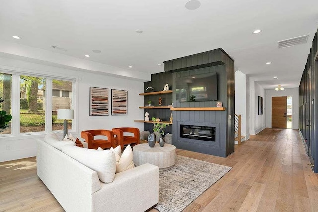 1598 Athens Ave, Atlanta, GA 30310 - living room featuring a fireplace, light wood-style flooring, visible vents, and recessed lighting
