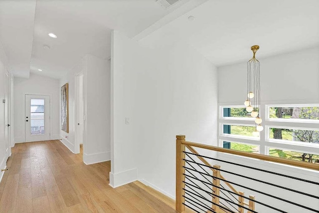 1598 Athens Ave, Atlanta, GA 30310 - hall with an upstairs landing, lofted ceiling, baseboards, visible vents, and light wood-style flooring