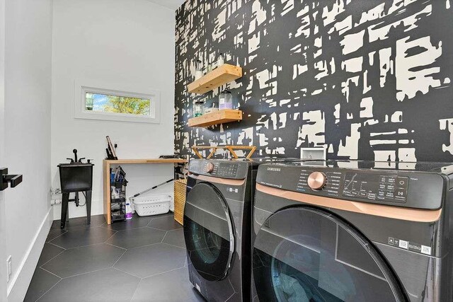1598 Athens Ave, Atlanta, GA 30310 - clothes washing area featuring washing machine and clothes dryer, tile patterned floors, baseboards, and laundry area