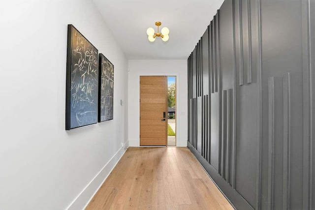 1598 Athens Ave, Atlanta, GA 30310 - hall with baseboards, a chandelier, and light wood finished floors