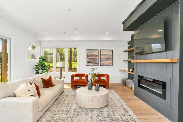 1598 Athens Ave, Atlanta, GA 30310 - living area with baseboards, recessed lighting, light wood-style floors, and a glass covered fireplace