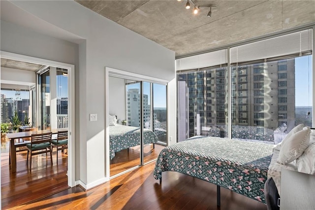 bedroom with wood-type flooring