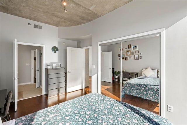 bedroom featuring a closet and hardwood / wood-style flooring