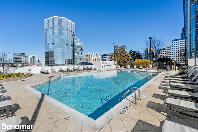 view of swimming pool with a patio