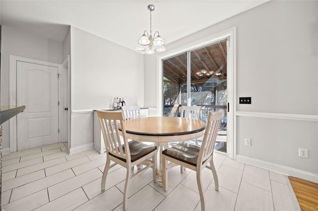 dining area with a chandelier