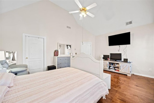 bedroom featuring ceiling fan, high vaulted ceiling, and hardwood / wood-style floors