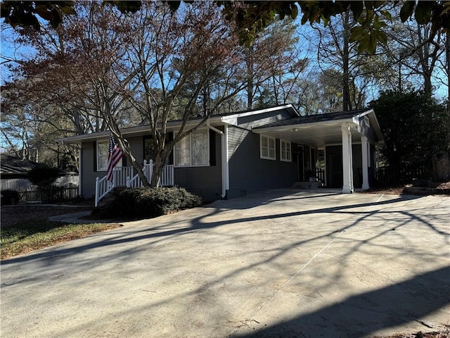 view of front of house featuring a carport