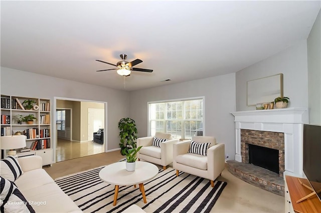 122 Melrose Creek Dr, Stockbridge, GA 30281 - carpeted living room featuring ceiling fan, a fireplace, and baseboards